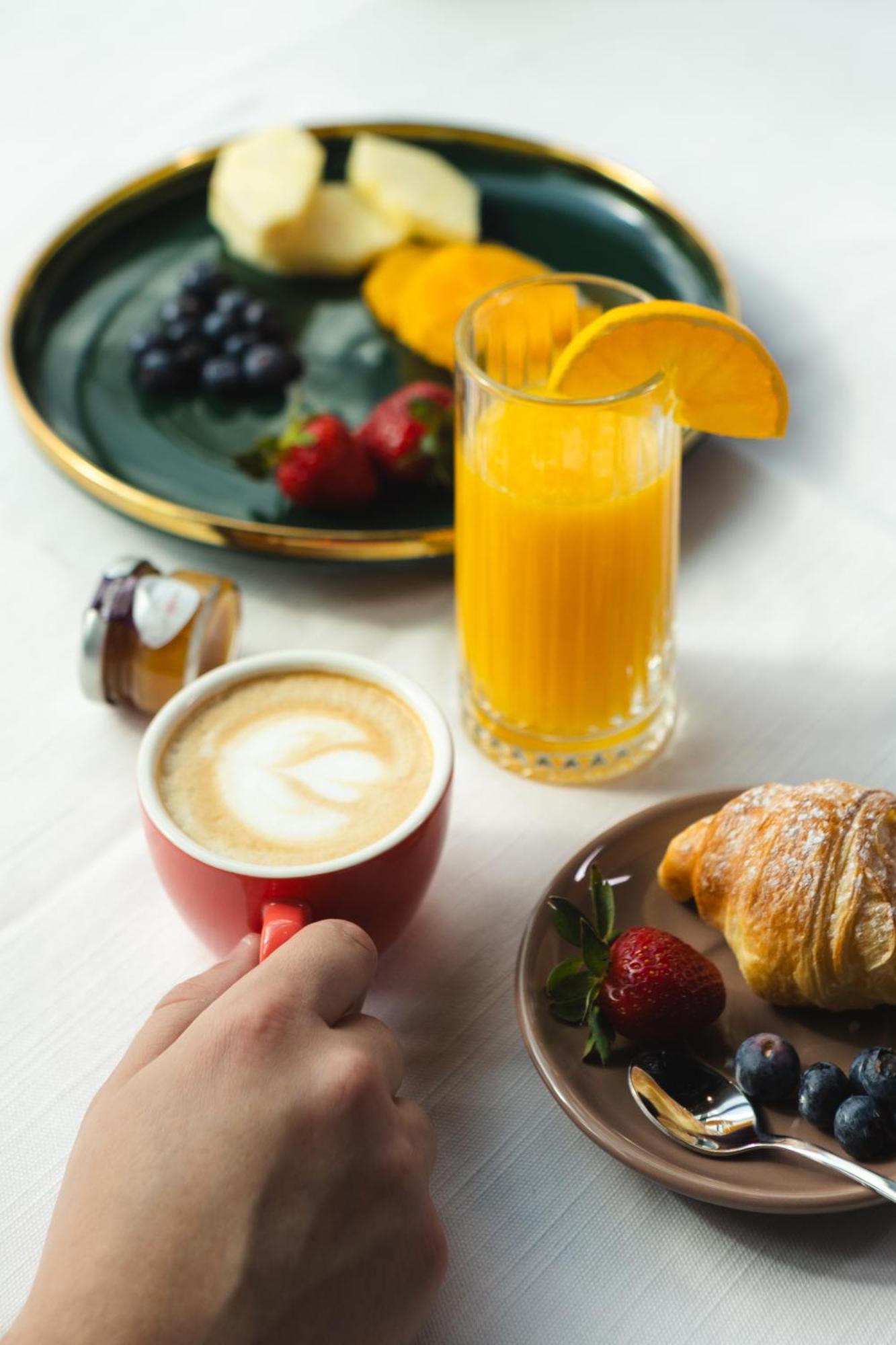 Hotel Platinia كلوج-نابوكا المظهر الخارجي الصورة A typical continental breakfast