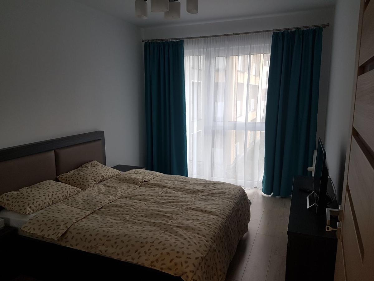 Hotel Platinia كلوج-نابوكا المظهر الخارجي الصورة A bedroom in a typical apartment